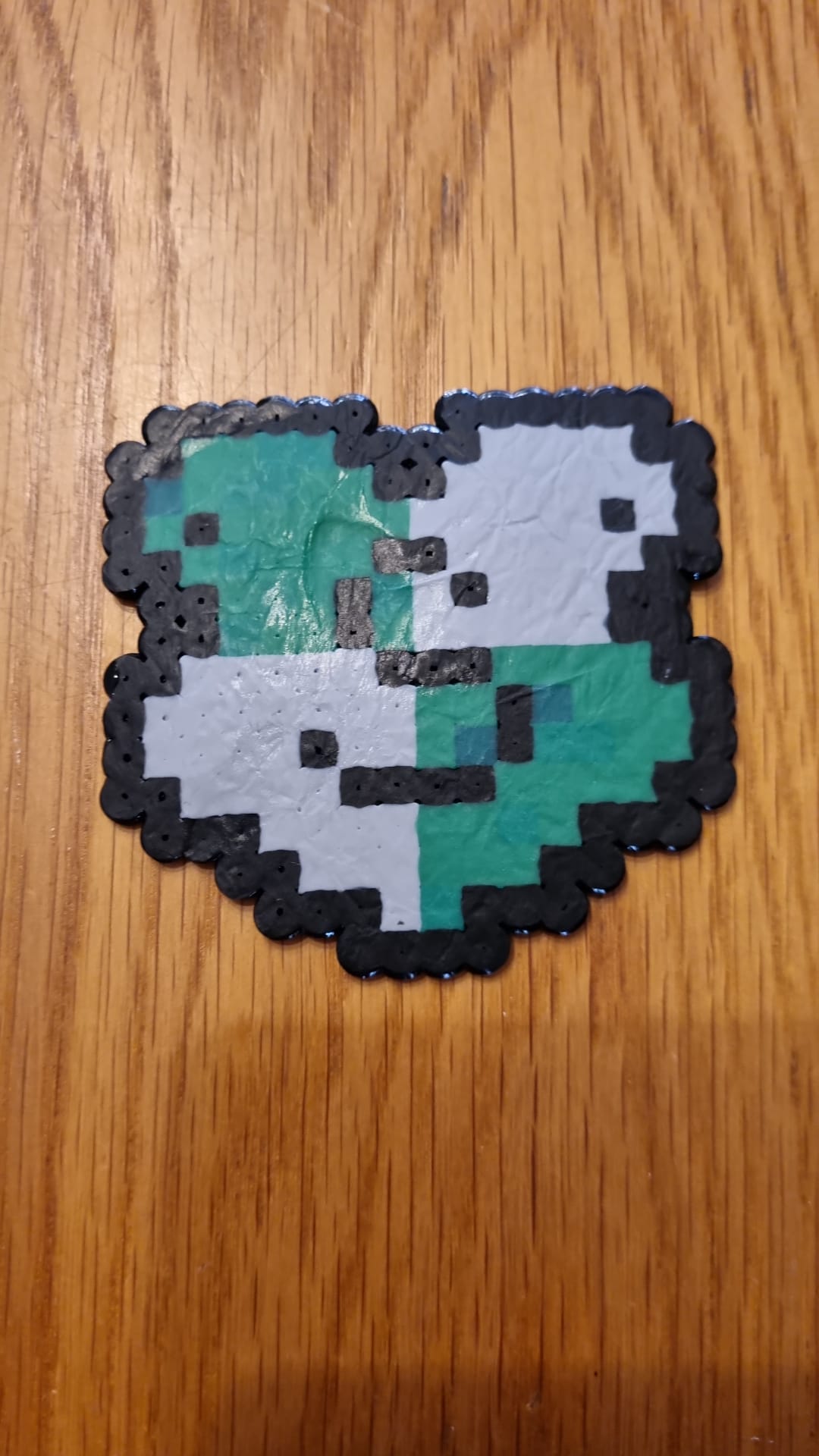 face with iron-on beads